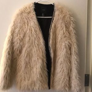 White faux fur jacket with silver beading
